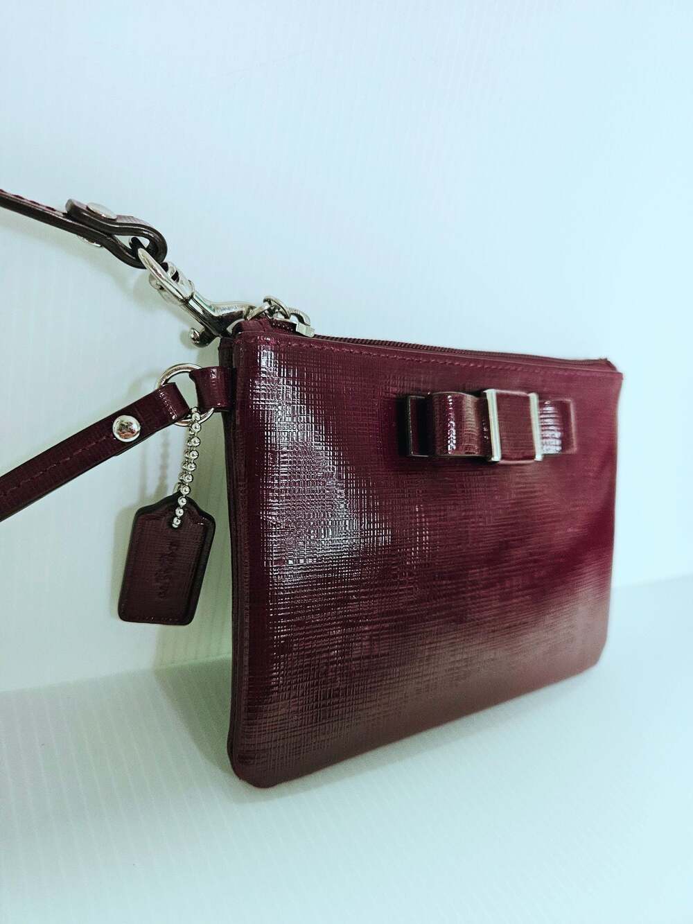 Coach Burgundy Crossgrain Leather Bow Wristlet EUC - Picture 3 of 16